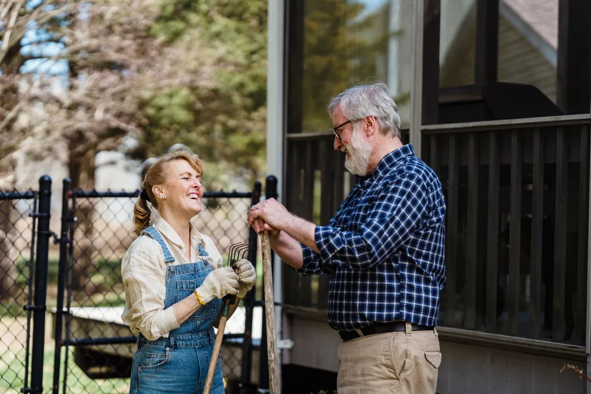 The CCRC decision: comparing your options - Elderly couple enjoying gardening